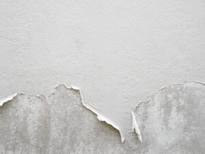 White peeling paint wall