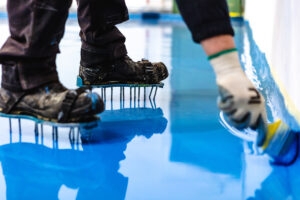 Self leveling blue epoxy floor in the gym