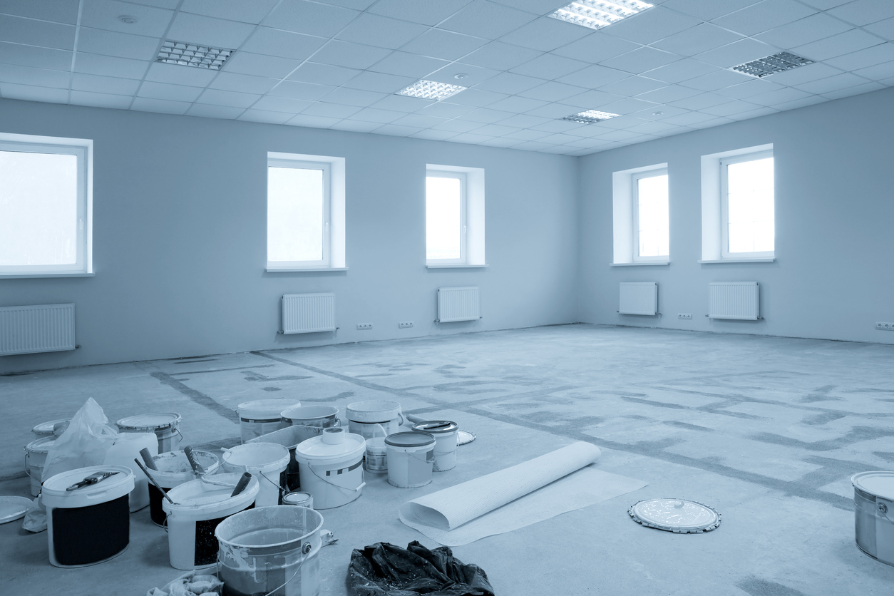 All white room with painting materials inside